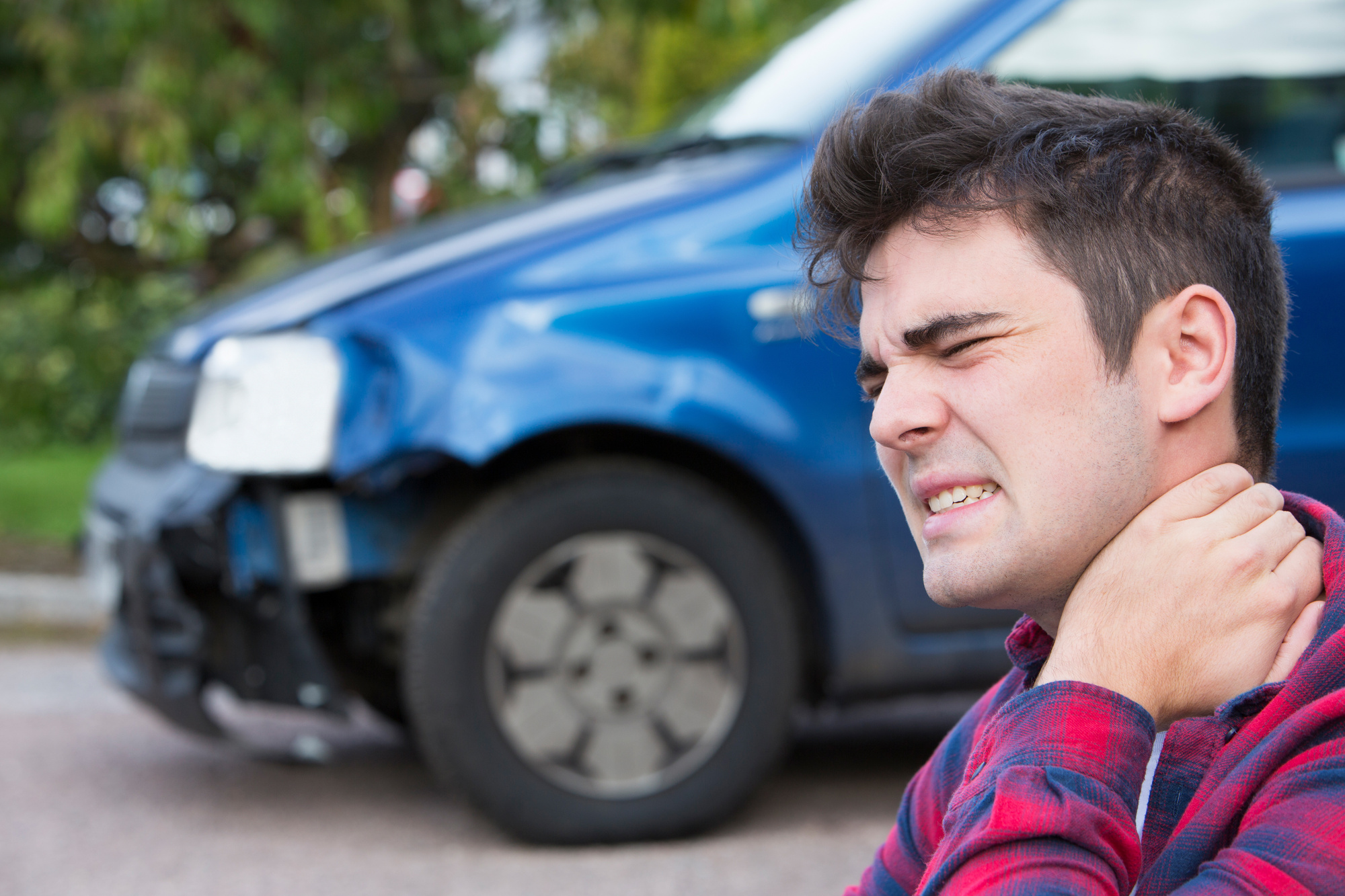 man with neck pain from car accident