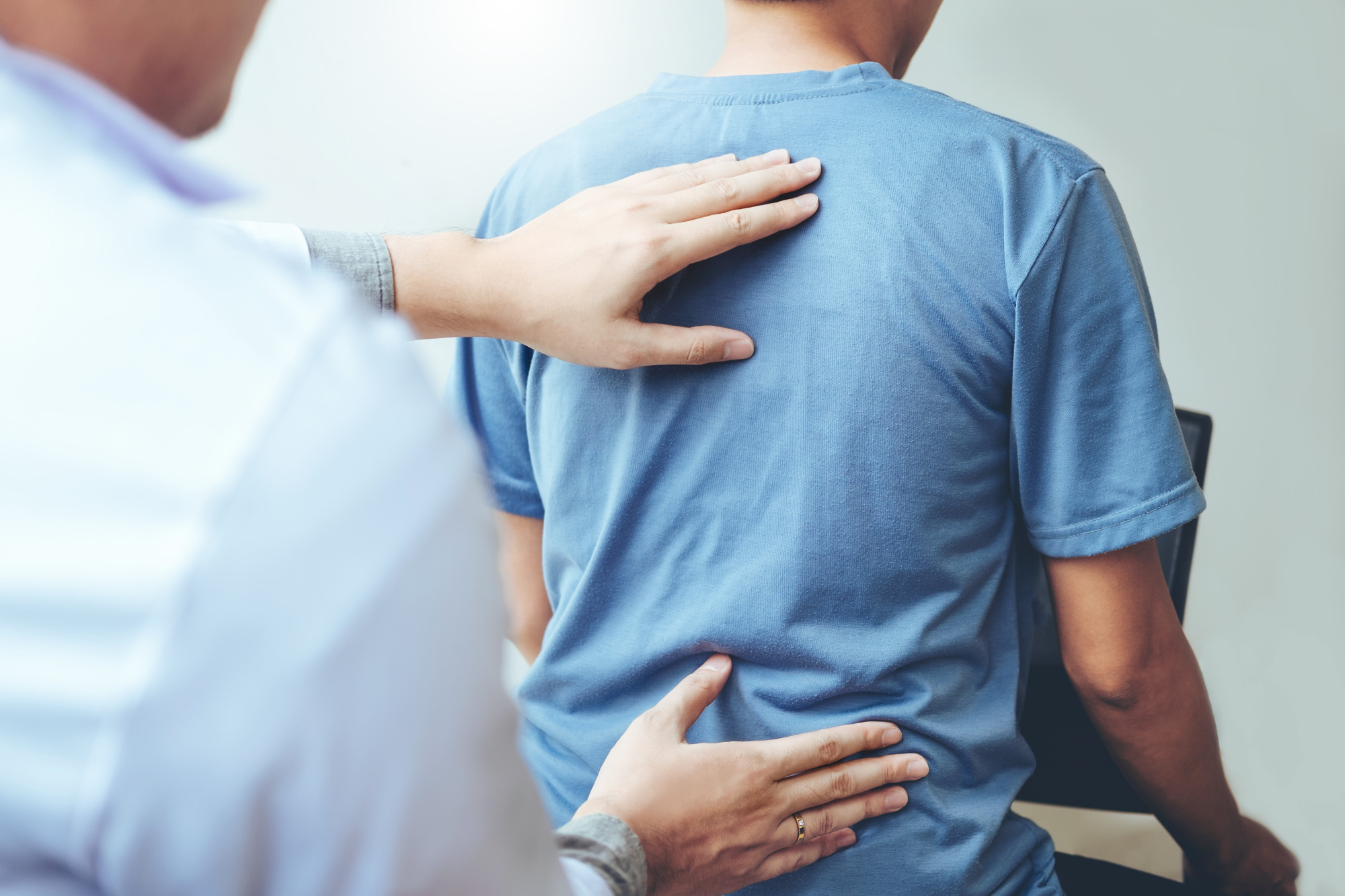 patient getting checked for chronic pain