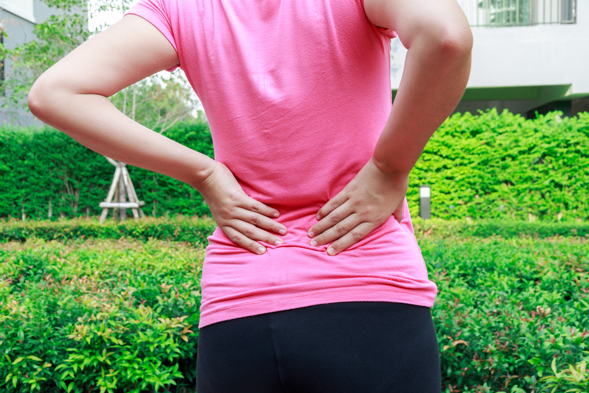 female with lower back pain
