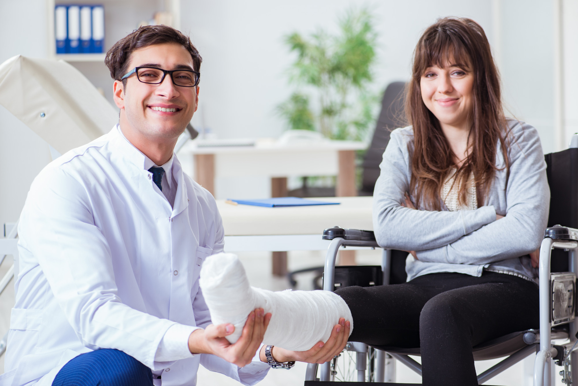 doctor helping patient with pain management